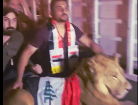 iraqi protesters lion vs dogs